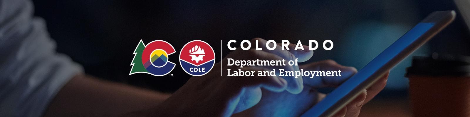 Colorado Department of Labor and Employment logo and name over a dark background.
